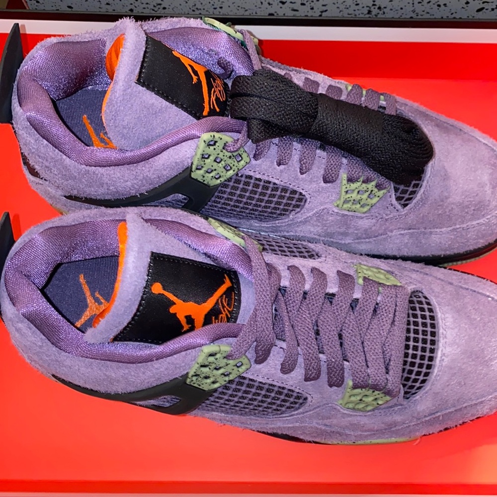 Nike Canyon Purple Jordan 4 Retro size 11.5 women’s and 10 men’s.